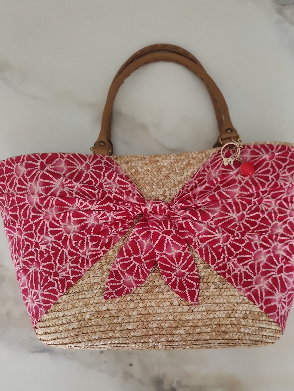 Calypso St. Barth Straw Tote with Pink Patterned Bow and Tan Handles